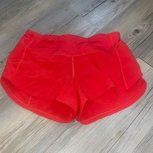 red speed up lululemon shorts 2.5’